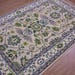 Hand Knotted Ivory Oushak Wool Rug - Floral Medallion