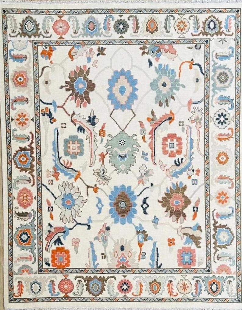Hand-Knotted Ivory Oushak Rug: Pastel Floral Wool Carpet