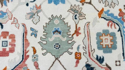 Hand-Knotted Ivory Oushak Rug: Pastel Floral Wool Carpet