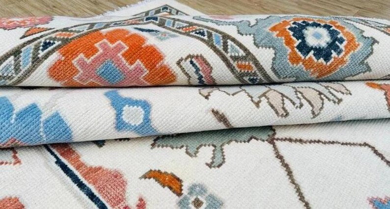 Hand-Knotted Ivory Oushak Rug: Pastel Floral Wool Carpet