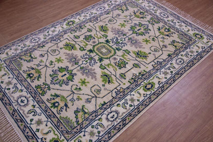 Hand Knotted Ivory Oushak Wool Rug - Floral Medallion