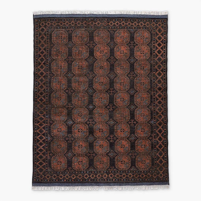 Decorative Oushak rug with intricate pattern on a white background
