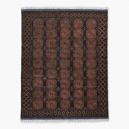 Decorative Oushak rug with intricate pattern on a white background