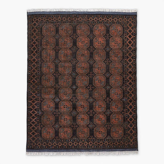 Decorative Oushak rug with intricate pattern on a white background