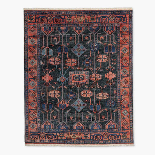 Decorative hand knotted oushak rug with intricate patterns on a white background
